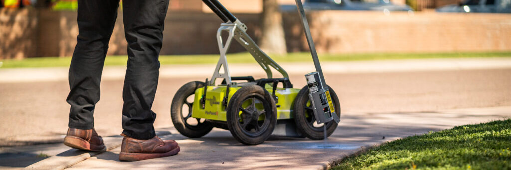 Man at work to locate any fault cable on the ground