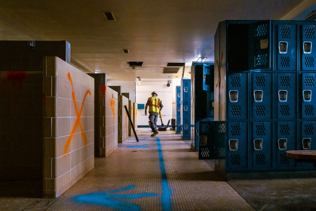 worker, in a building, scanning concrete