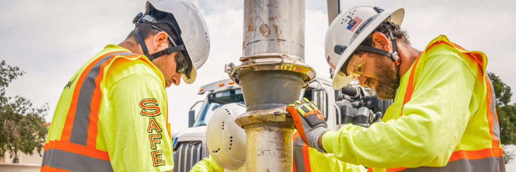 Men at work with safety equipment