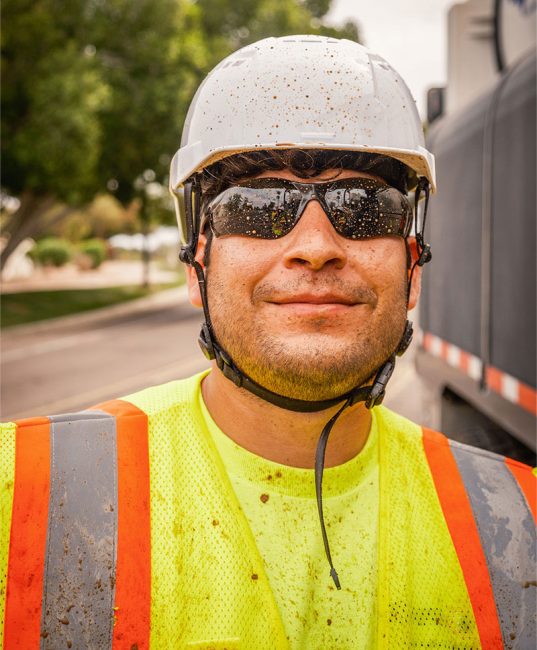 Man at work using a protecting helmet